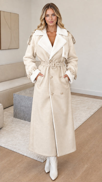 Full-length front view of woman wearing beige cream faux shearling maxi coat