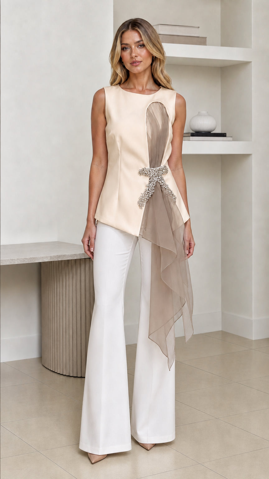Front view of woman wearing champagne color variant of the asymmetric top