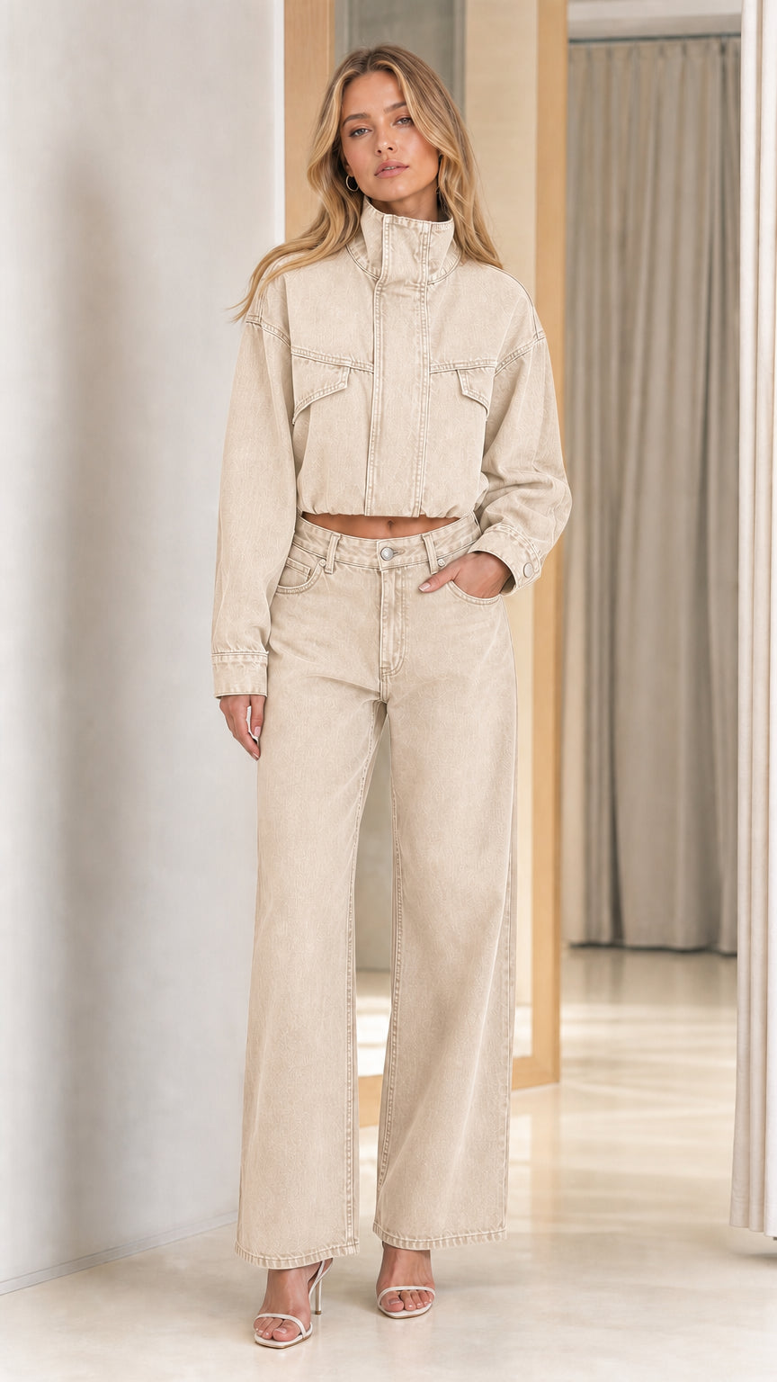 Model wearing ecru off white washed denim cropped jacket and wide leg pants matching set