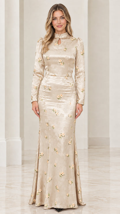 Front view of champagne gold floral jacquard long sleeve formal gown
