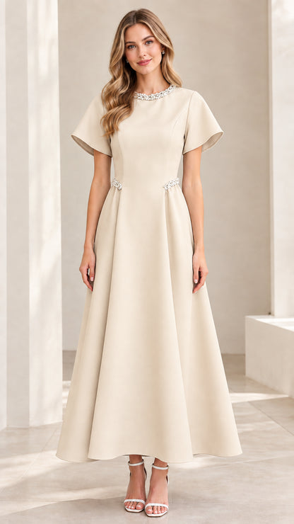 Model wearing Champagne cream pearl-adorned A-line evening dress