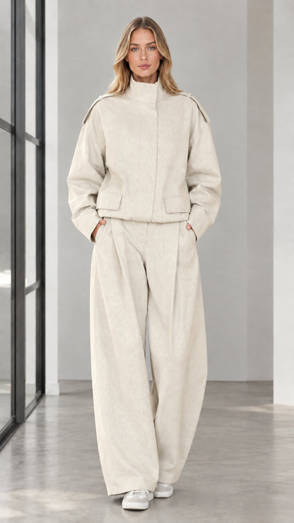Full front view of woman wearing Cream off-white cropped jacket and wide leg trousers set
