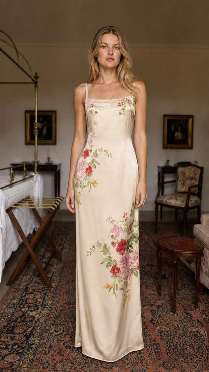 Model wearing champagne floral satin maxi dress