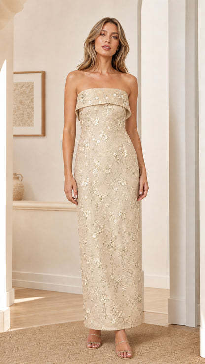 Model wearing champagne gold strapless floral embroidered maxi dress