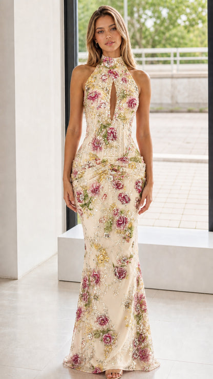 Front view of champagne floral embroidered halter evening dress