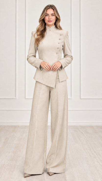 Full length view of women's beige cream asymmetric blazer and wide-leg trouser suit set