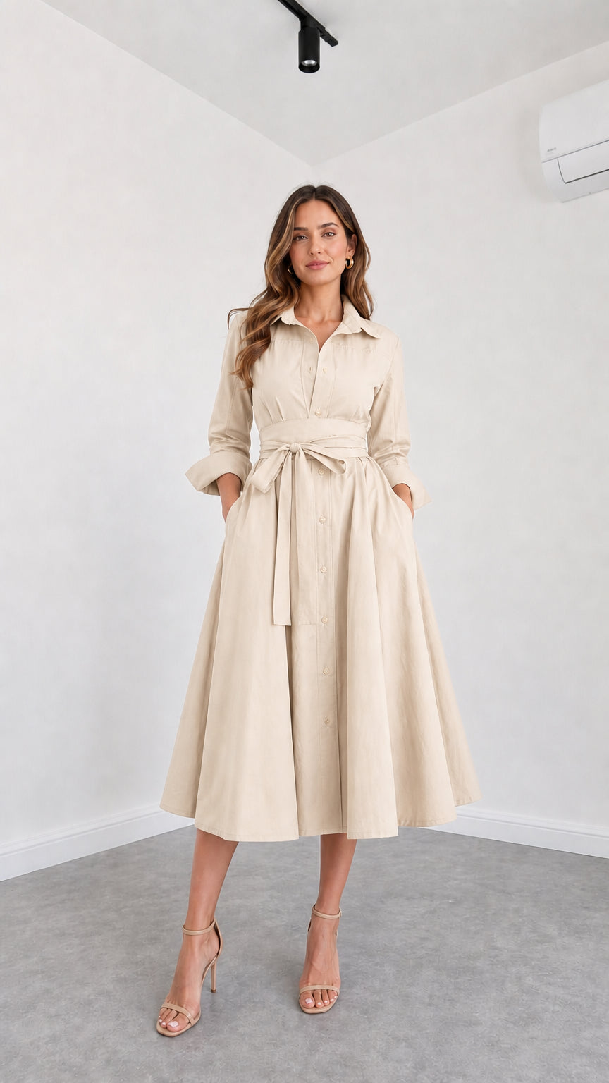 Front view of model wearing Beige button-down belted midi shirt dress