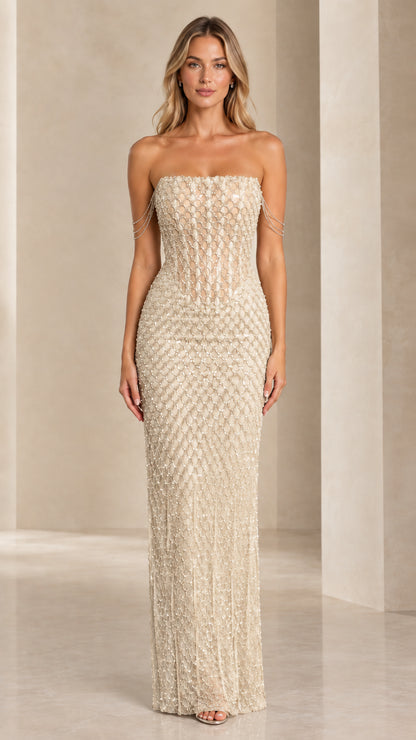 Front view of model wearing Champagne gold strapless beaded column gown