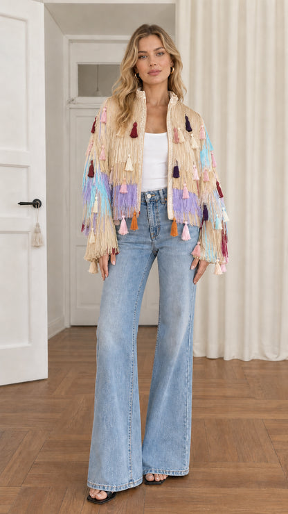 Full-length shot of model wearing beige champagne multi fringe tassel jacket