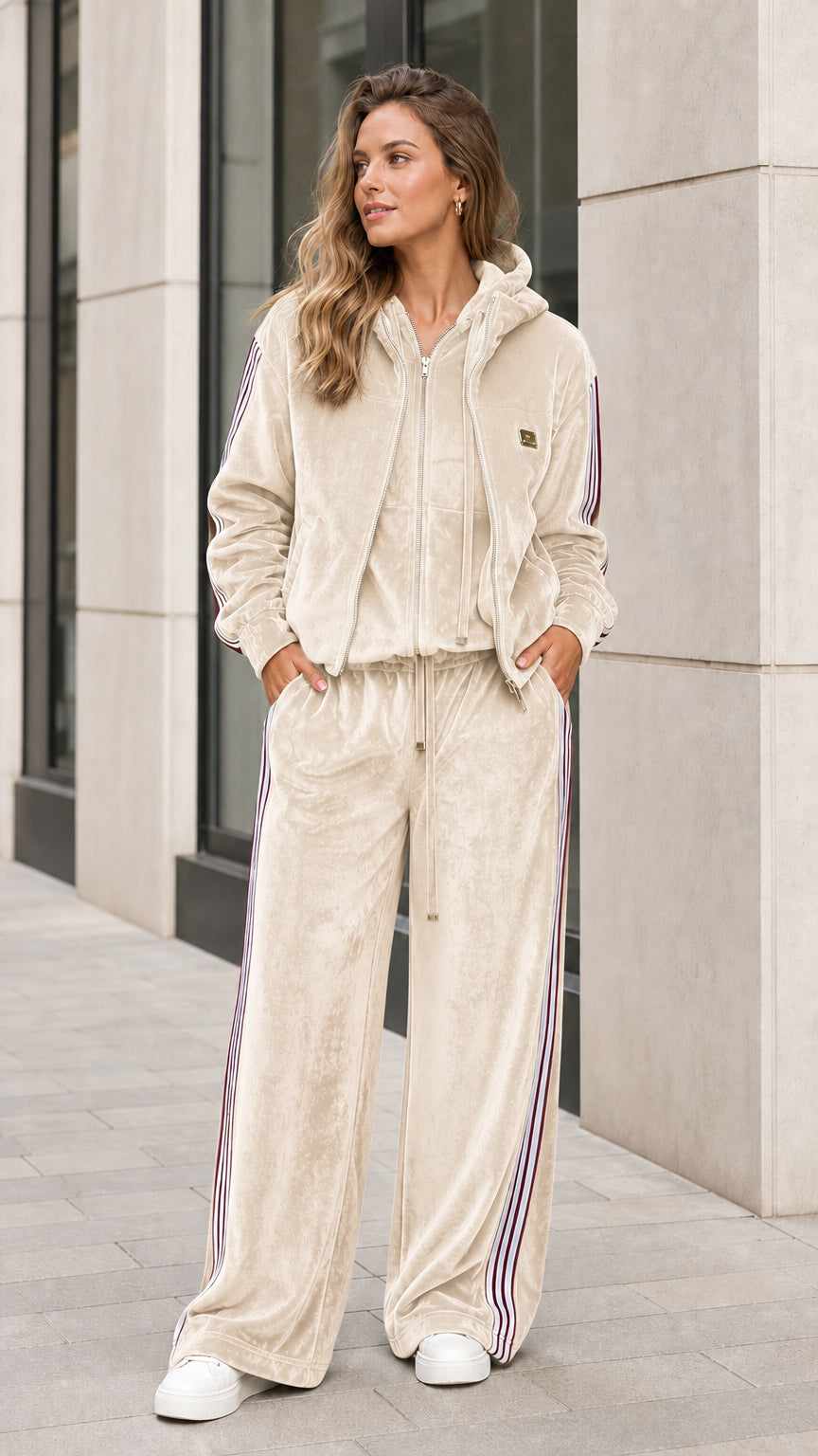 Full front view of beige cream velour two-piece tracksuit set with burgundy side stripes