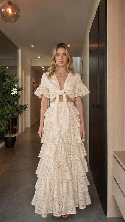 Model wearing beige eyelet embroidered two-piece set