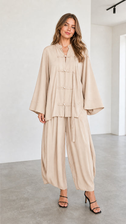 Women's beige neutral two-piece matching tunic and lantern pants set