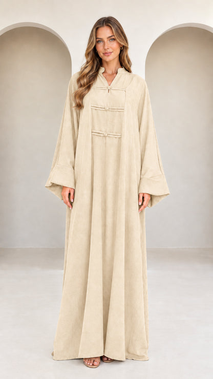 Front view of model wearing beige cream full length kaftan maxi dress