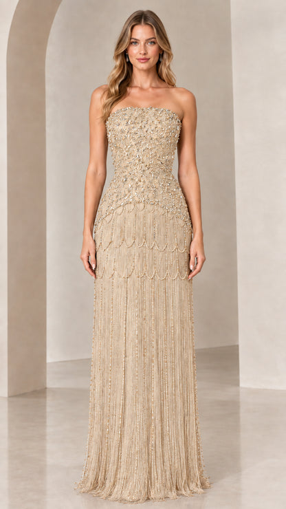 Front view of strapless beaded fringe evening gown in champagne