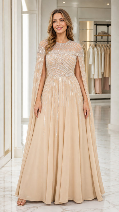 Front view of champagne evening gown with beaded capelet
