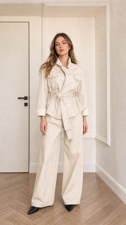 Model wearing off-white denim utility jacket and matching pants