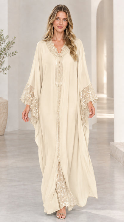 Model wearing cream champagne lace-trim maxi caftan dress