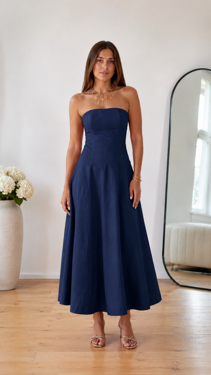 Front view of navy strapless A-line midi dress