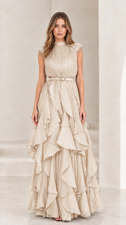 Front view of champagne cream pleated tiered ruffle evening gown