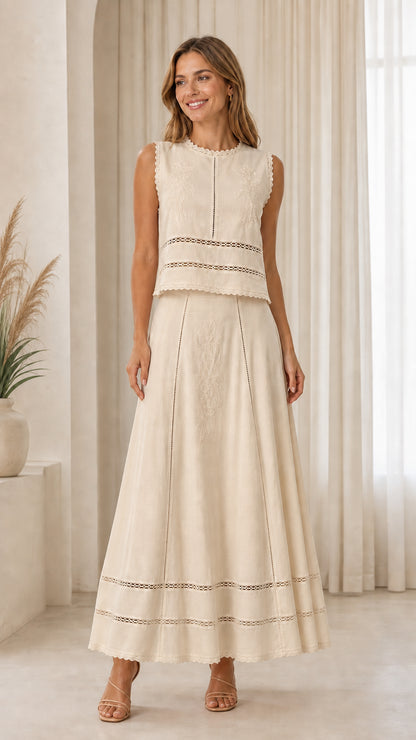 Woman wearing cream embroidered two-piece set