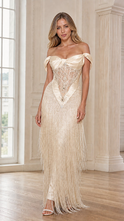 Front view of champagne off-the-shoulder fringe evening gown
