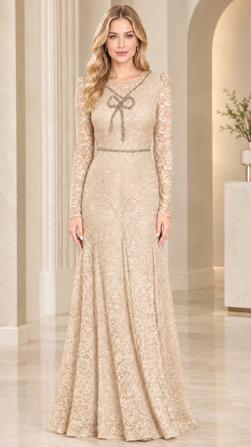 Front view of model wearing champagne gold lace long sleeve evening gown
