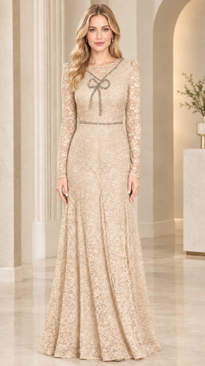 Front view of model wearing champagne gold lace long sleeve evening gown