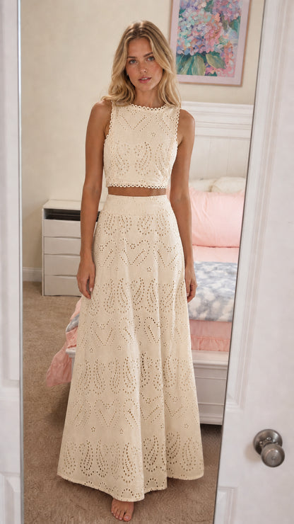 Front view of model wearing cream eyelet two-piece set