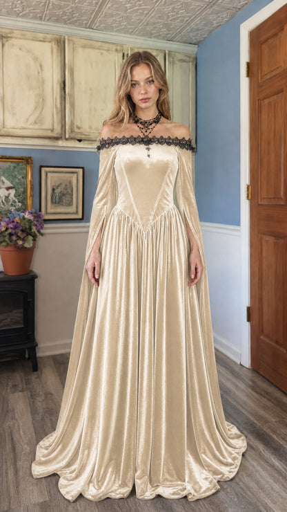 Model wearing Champagne velvet off-shoulder maxi dress