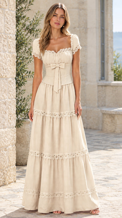 Full-length view of woman wearing cream lace trim tiered maxi dress