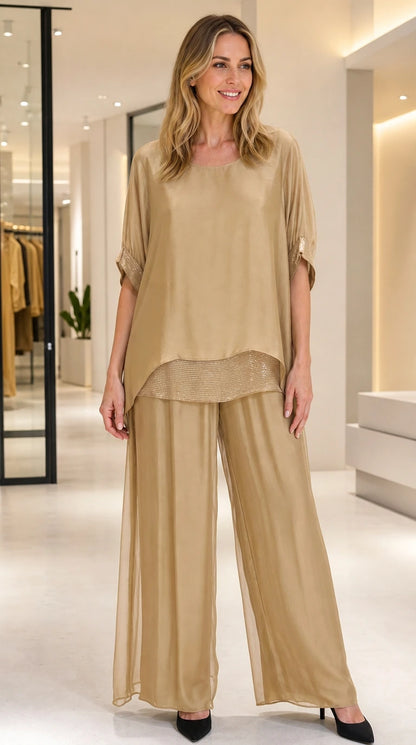 Full front view of women's champagne gold 2-piece elegant pant set