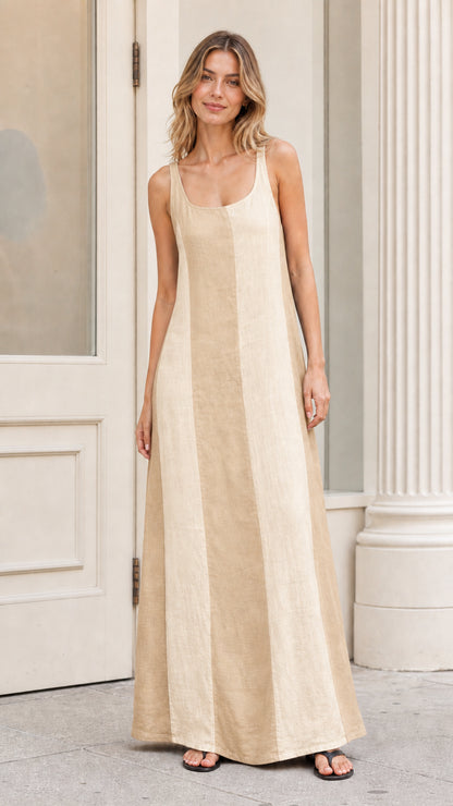 Front view of model wearing beige color-blocked maxi dress