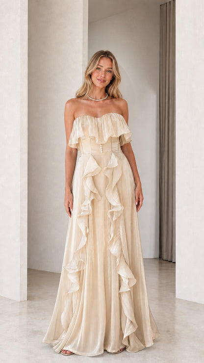Front view of champagne strapless ruffled evening dress